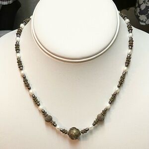 Handcrafted, beaded necklace with toggle clasp.